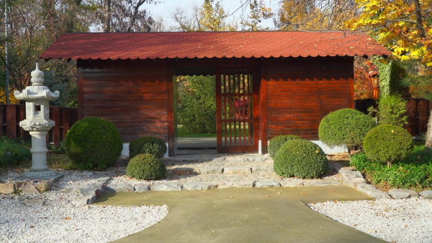 Wooden gate in a park in autumn