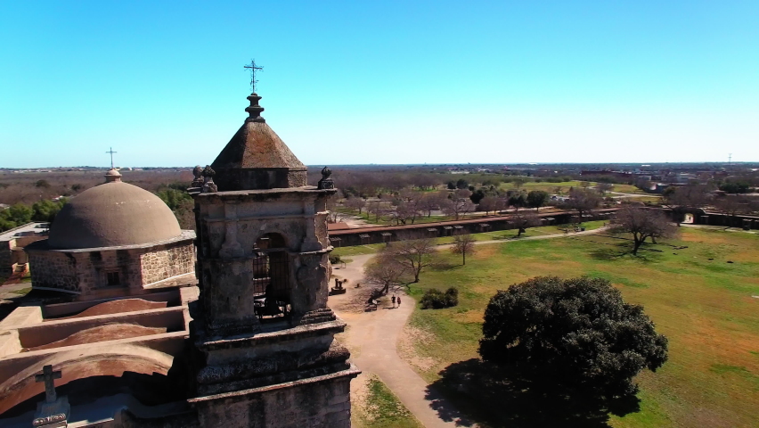 Aerial Panning Shot Of Famous Old Church In National Park Against Clear Sky On Sunny Day - San Antonio, Texas