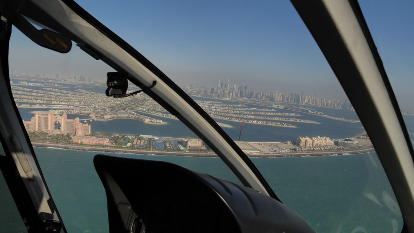 Palm Jumeirah Island, Dubai UAE, Aerial View From Helicopter Cockpit Royalty-Free Stock Footage #1097346993