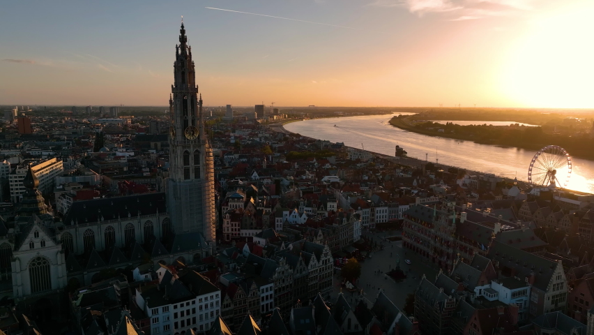 4K Aerial view of cityscape of Antwerpen, gothic style landmark Cathedral of Our Lady Antwerp and historic center of city Belgium from above, Europe view at night Royalty-Free Stock Footage #1097348827