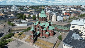 The Uspenski Cathedral, an Orthodox church situated on the hill of Katajanokka peninsula in Helsinki, Finland. Aerial video.