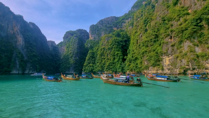 Pileh Lagoon Koh Phi Phi Thailand with the green emerald ocean at Koh Phi Phi Thailand | Shutterstock HD Video #1097364645