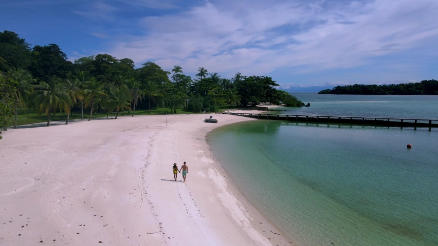 Couple man and women on a tropical island in Thailand, Koh Kham Island Trat Koh Mak Thailand | Shutterstock HD Video #1097364653