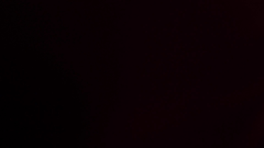 Two man shout victorious watching game on TV at home