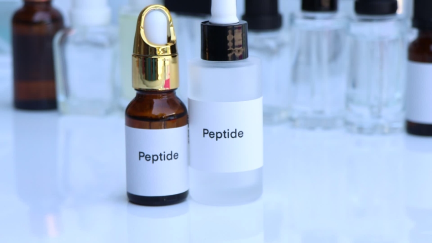 Peptide in a bottle, chemical ingredient in beauty product, skin care products | Shutterstock HD Video #1097374703