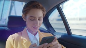 Cinematic storytelling corporate video about a young business woman working in a futuristic city.	 Businesswoman sitting on the back seat of an elegant business car