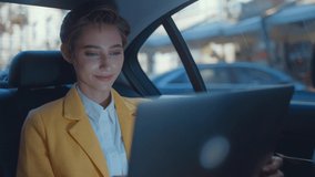 Cinematic storytelling corporate video about a young business woman working in a futuristic city.Businesswoman sitting on the back seat of an elegant business car