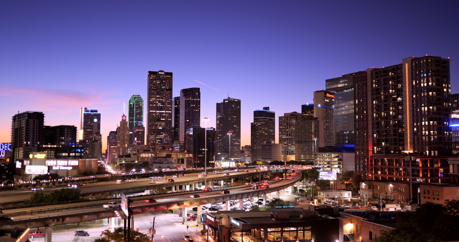 Dallas, Texas, USA - November 13, 2021:  Downtown city skyline view over the highway as seen from Deep Ellum in Dallas Texas USA at night