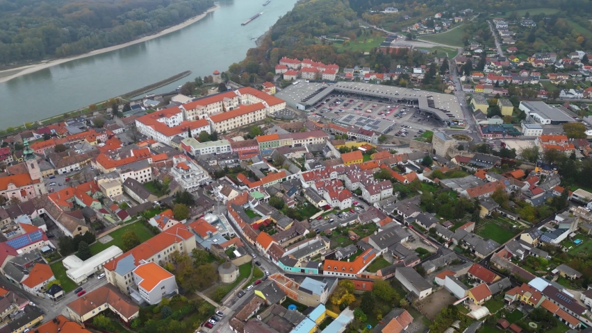 Aerial wide view around the city Hainburg an der Donau in Austria on a cloudy autumn afternoon	
