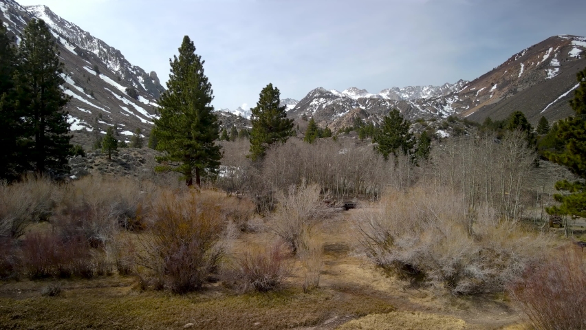 Scenic landscape of snow capped Eastern Sierra mountains in springtime near Aspendell, California