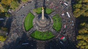 High angle view of crowd of demonstrators on Iranian gathering. People with national flags and banners. Berlin, Germany - Powered by Shutterstock - Get 15% off with code: PIKWIZARD15
