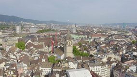 Inscription on video. Zurich, Switzerland. Panorama of the city from the air. St. Peter Church. Text furry, Aerial View, Point of interest
