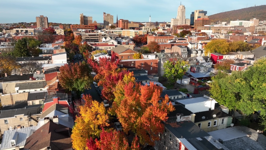 Urban American city in USA. Aerial of downtown housing project district in autumn fall color.