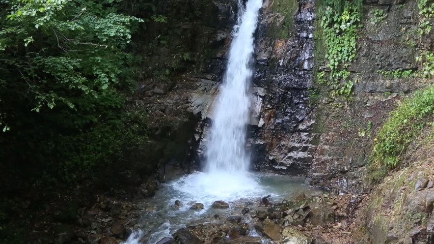 Waterfall basin in the mountains | Shutterstock HD Video #1097424355