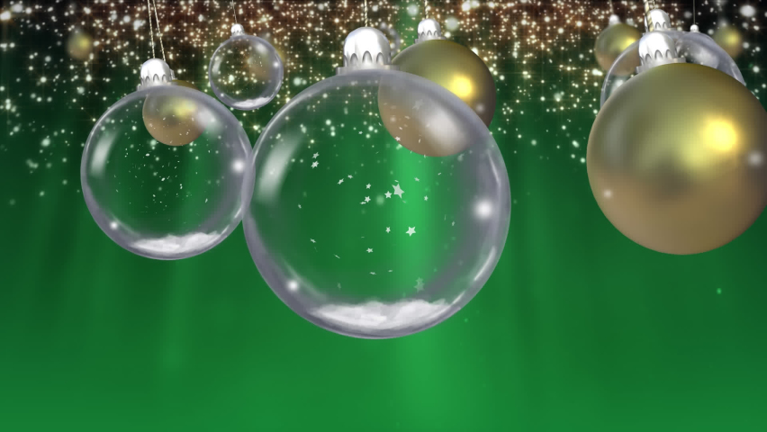 Animation of baubles and light spots over green background. Christmas, tradition and celebration concept digitally generated video. | Shutterstock HD Video #1097424543