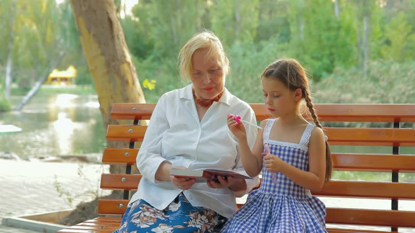 Grandmother Telling A Story To Stock Footage Video 100 Royaltyfree