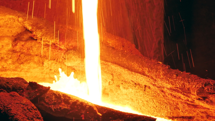Molten copper is getting cast in the foundry Royalty-Free Stock Footage #1097435593