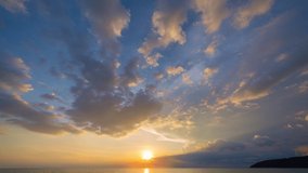time lapse scenery sunset above the ocean clouds cover the ocean. Cloud in sunset on Karon beach Phuket Thailand. 
