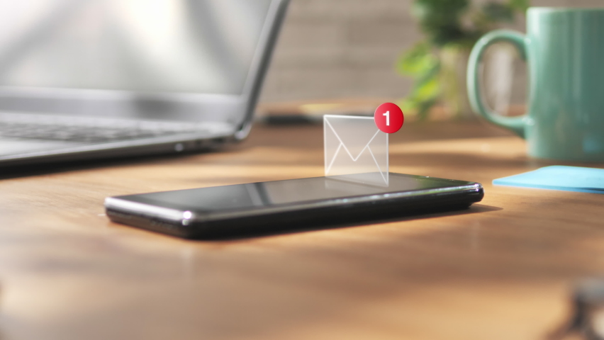 Smart phone mobile receiving mail message,email notification allarm appears on smartphone screen on desk table | Shutterstock HD Video #1097445589