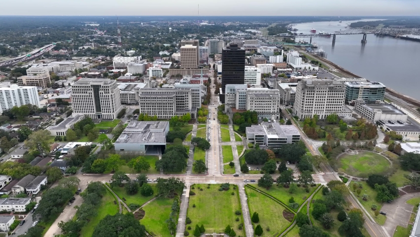 Baton Rouge Louisiana aerial establishing shot from capitol complex park. Mississippi River.