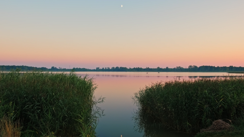 
Peaceful Lake Shore after Evening Sunset