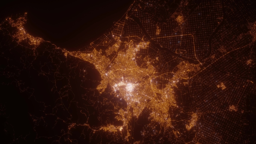 Sapporo (Japan) aerial view at night. Top view on modern city with street lights. Camera is flying above the city, moving backward