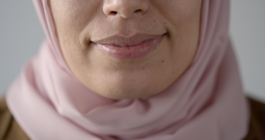 Close-up mouth of woman in hijab | Shutterstock HD Video #1097476539