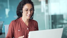 Corporate operator working in customer support service on helpline telesales Smiling woman representative call center agent in wireless headset helping client with complaints using computer in office - Powered by Shutterstock - Get 15% off with code: PIKWIZARD15