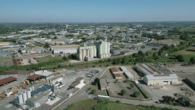Industrial factory of Laval town, Mayenne in France. Aerial drone forward