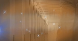 Animation of stars over caucasian businessman in server room. Global business, computing and digital interface concept digitally generated video.