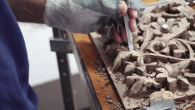 Closeup Shot Of A Master Craftsman Doing Traditional Wood Carving - Powered by Shutterstock - Get 15% off with code: PIKWIZARD15