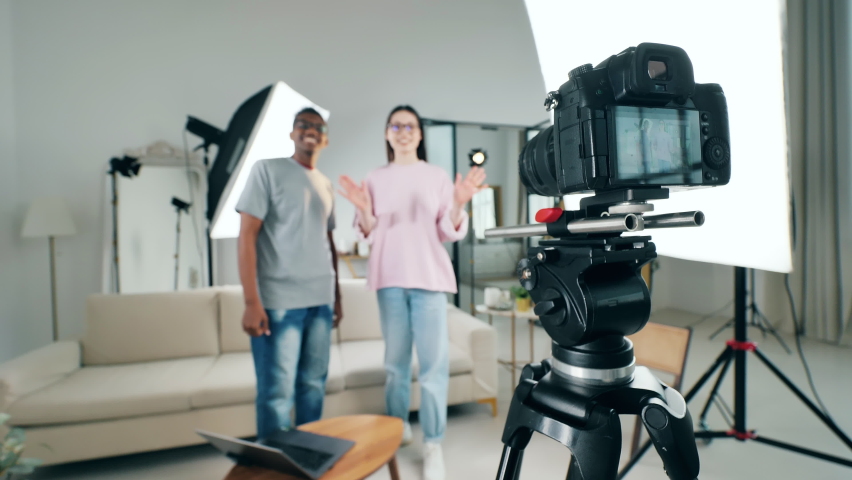 Camera display with a video of two young people in the studio | Shutterstock HD Video #1097516207
