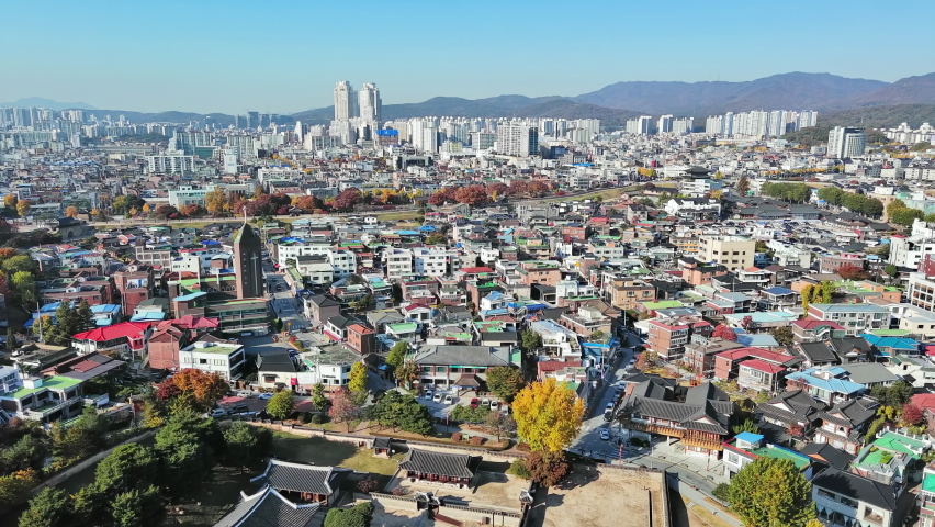 Suwon: Aerial view of city in South Korea in autumn colors, clear blue sky - landscape panorama of Eastern Asia from above