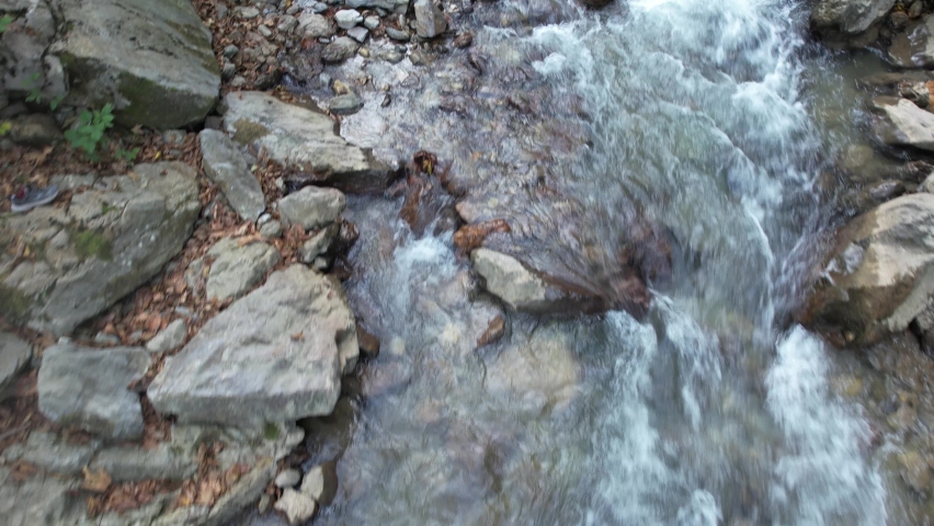Creek, aerial creek and small waterfall in nature | Shutterstock HD Video #1097517779