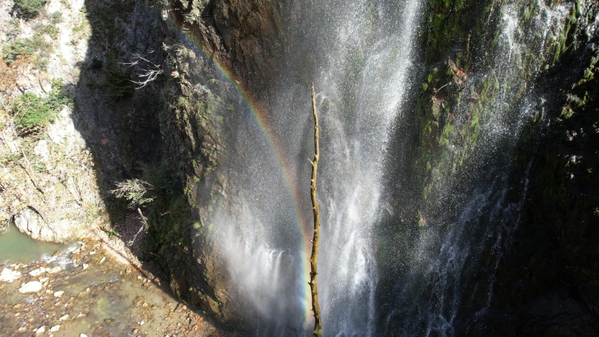 Waterfall, aerial waterfall and rainbow in nature | Shutterstock HD Video #1097517791