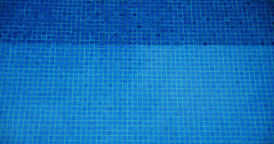 Blue water swimming pool top down static view. Relax chill out vacation sport recreation background. Aqua ripple. Small tiles. | Shutterstock HD Video #1097519767