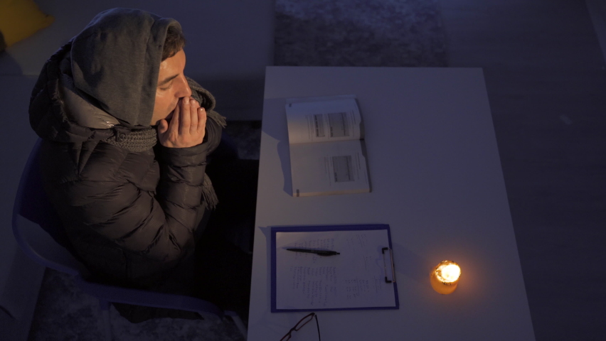 Man sick with cold at home.
Power outage at home. Natural gas outage. The man shivering in the cold.
 | Shutterstock HD Video #1097523967