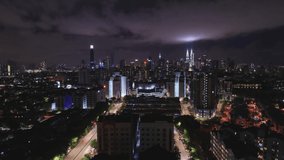 Low clouds timelapse at night in Kuala Lumpur City.