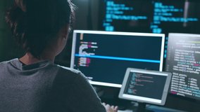 Young Asian woman, developer programmer, software engineer, IT support, working hard at night overtime on computer to check coding in bugging system - Powered by Shutterstock - Get 15% off with code: PIKWIZARD15