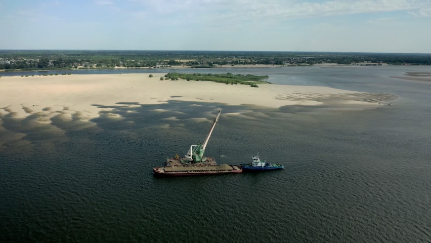 A large cargo ship under the control of a drone.