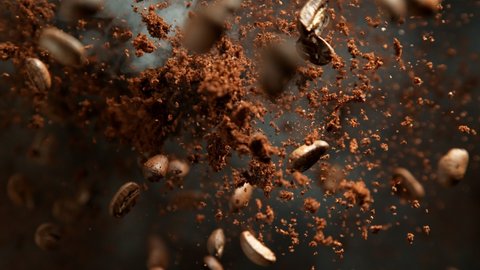 Super Slow Motion Shot of Ground Coffee and Fresh Beans Explosion Towards Camera at 1000fps. : vidéo de stock