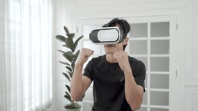 Asian man enjoy playing virtual reality games, Healthy young woman wearing VR glasses exercising.