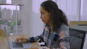 Attractive african american female student online video chat using laptop computer,  remote studying, learning or working in internet. , distance job interview concept, webcam view.