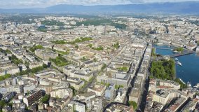 Inscription on video. Geneva, Switzerland. Flying over the central part of the city in the morning hours. Appears from the sand, Aerial View