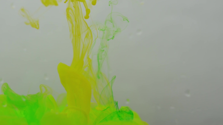 Colored paints are mixed in water. Bright abstract background. | Shutterstock HD Video #1097593053