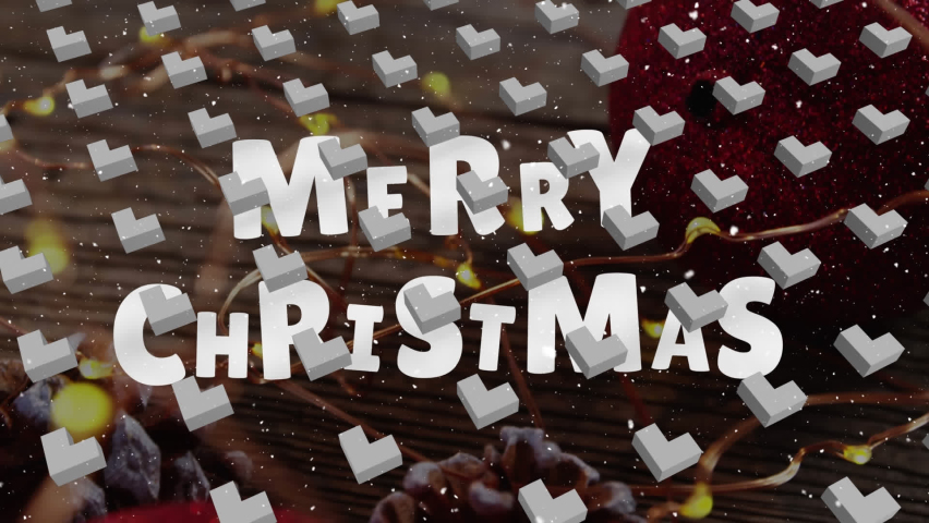 Series of abstract shapes moving in formation on a green screen background, with snow falling on a black background. the text "merry christmas" is superimposed over the top of the scene. | Shutterstock HD Video #1097602871