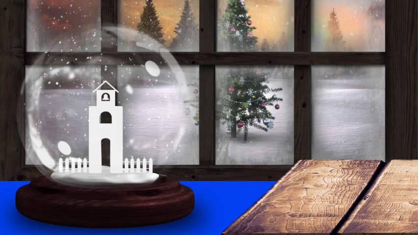Christmas celebration tradition concept. animation of winter scenery seen through window. animation of christmas decoration with bell tower in snow globe on black background. | Shutterstock HD Video #1097602875
