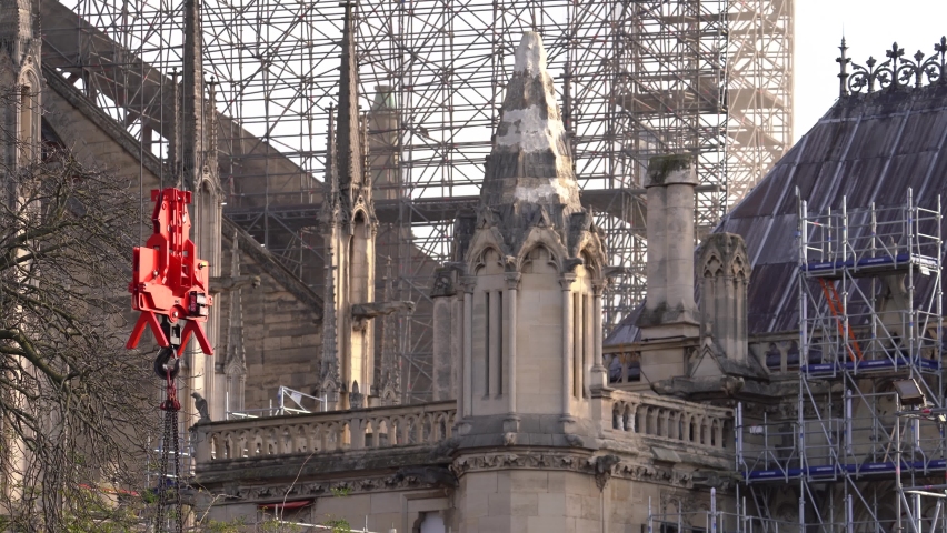 Reconstruction And Restoration Of Notre Dame Cathedral In Paris, France After Fire In 2019. Crane Hook Lifting Materials At The Site. static | Shutterstock HD Video #1097627353