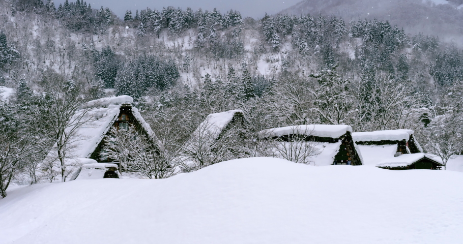 Snowfall in Shirakawa-go village in winter, UNESCO world heritage sites, Japan. | Shutterstock HD Video #1097634615