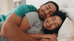 Love, morning and wake up with a black couple in bed cuddling in the bedroom of their home together. Sleeping, happy and smile with an affectionate man and woman hugging while bonding in a house - Powered by Shutterstock - Get 15% off with code: PIKWIZARD15